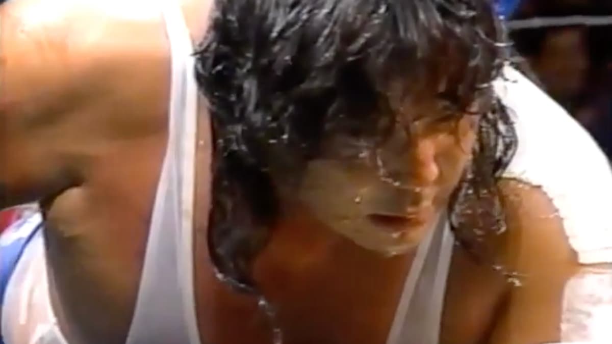 Atsushi Onita dripping with water at FMW Fifth Anniversary Show