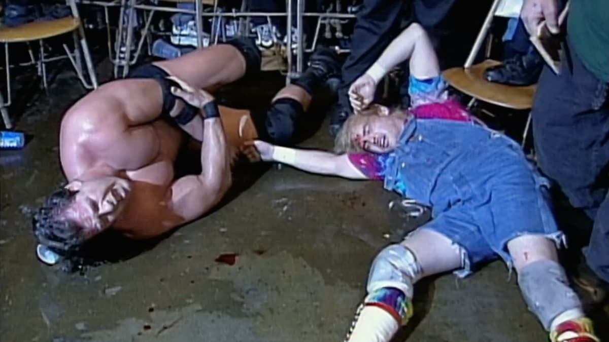 Mike Awesome and Spike Dudley lying on the ground at ECW Guilty as Charged 2000