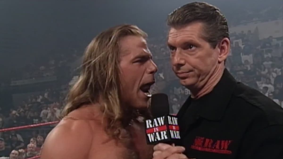 Shawn Michaels shouting in Vince McMahon's face, who looks bemused, on WWF Raw