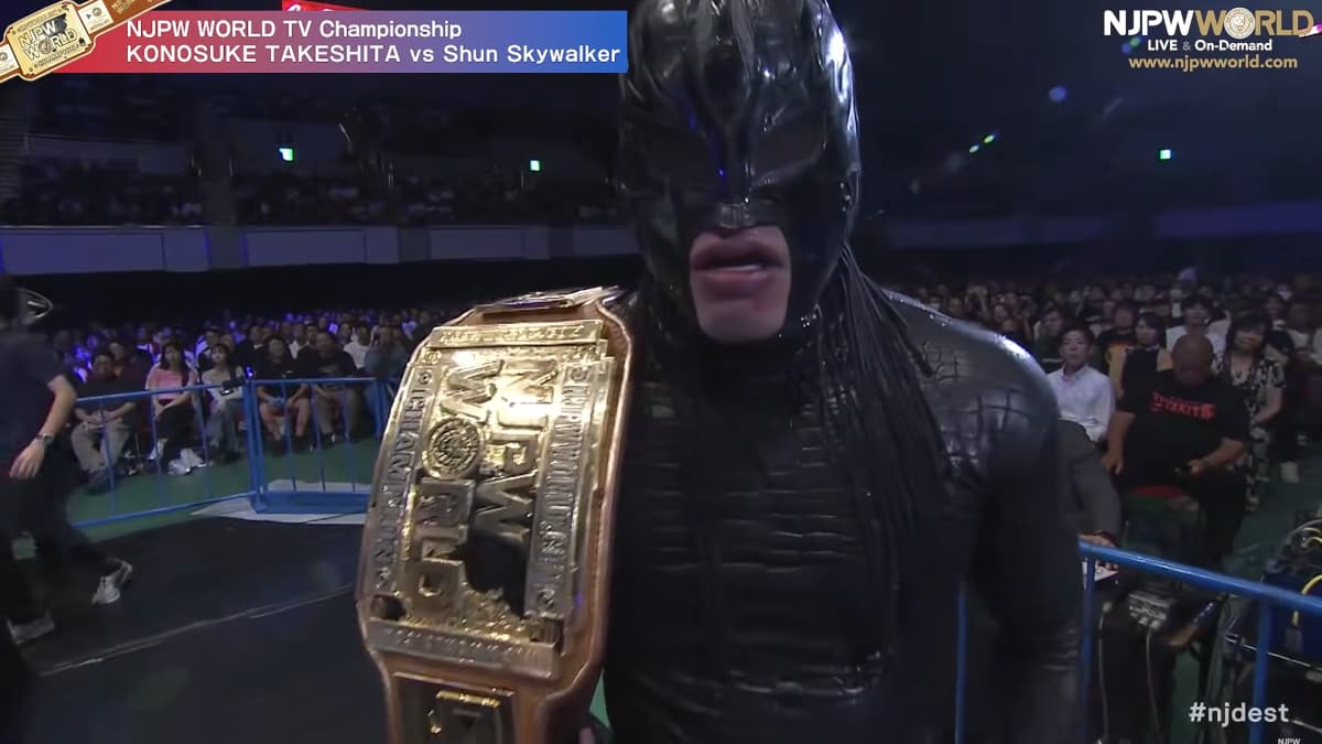 Shun Skywalker glares with the NJPW World TV Championship over his shoulder
