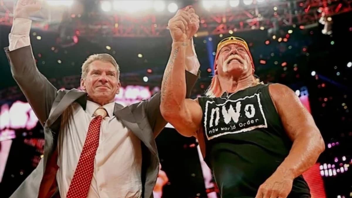 Hulk Hogan and Vince McMahon holding hands