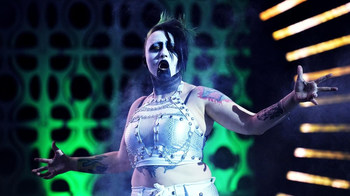 Abadon, wearing white face paint, makes their entrance before a match for Ring of Honor