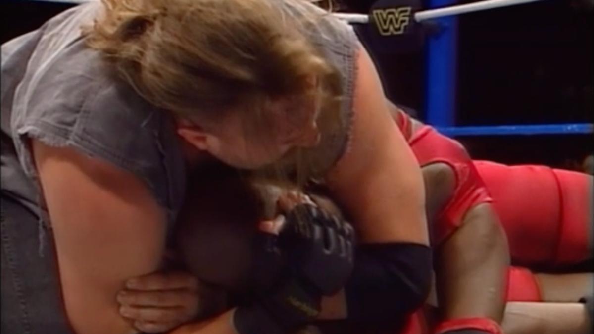 Crush with Ahmed Johnson in a sleeper on the April 14, 1997 episode of Raw
