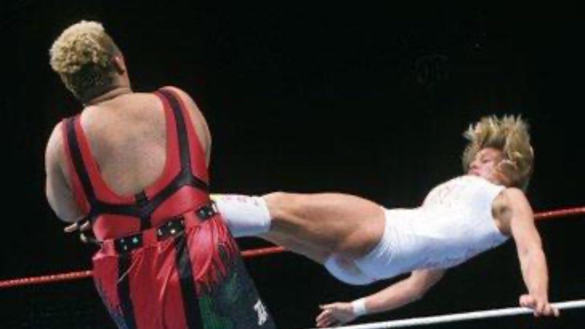 Alundra Blayze hitting Aja Kong with a drop kick