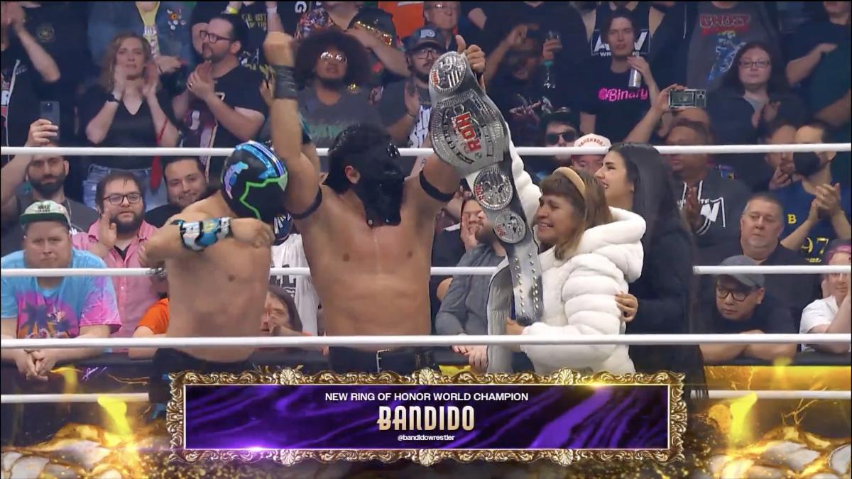 Bandido with ROH World Title at AEW Dynasty 2025