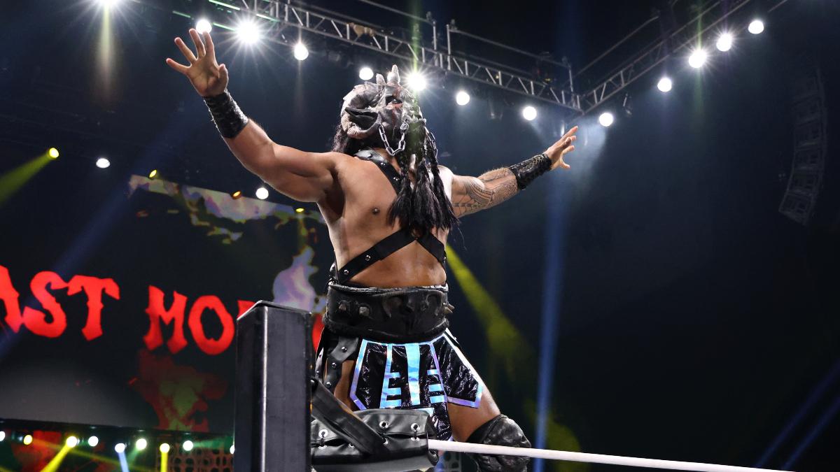 Beast Mortos posing on the top turnbuckle 