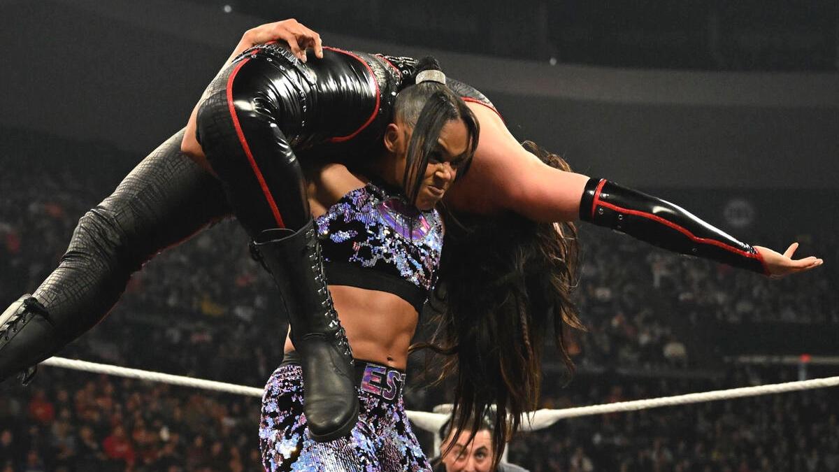 Bianca Belair lifting up Raquel Rodriguez on her shoulders on WWE Raw