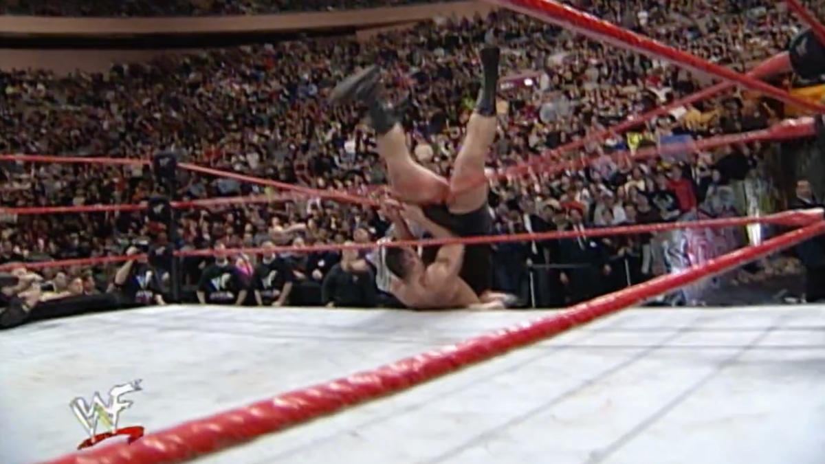 The Big Show and Rock tumbling over the top rope at WWE Royal Rumble 2000
