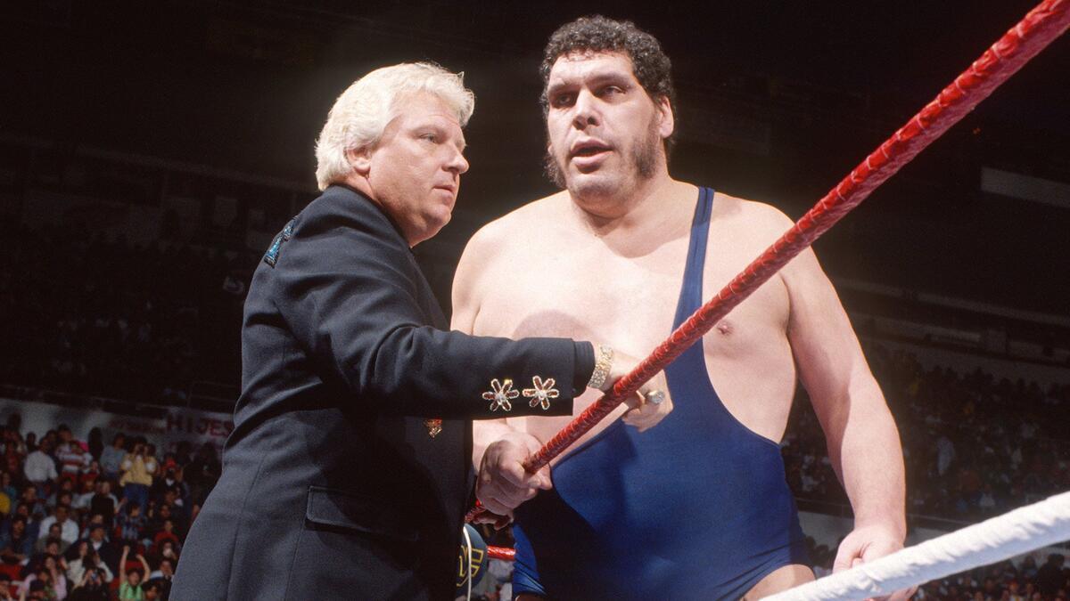 Bobby Heenan with Andre the Giant leaning on the ring ropes