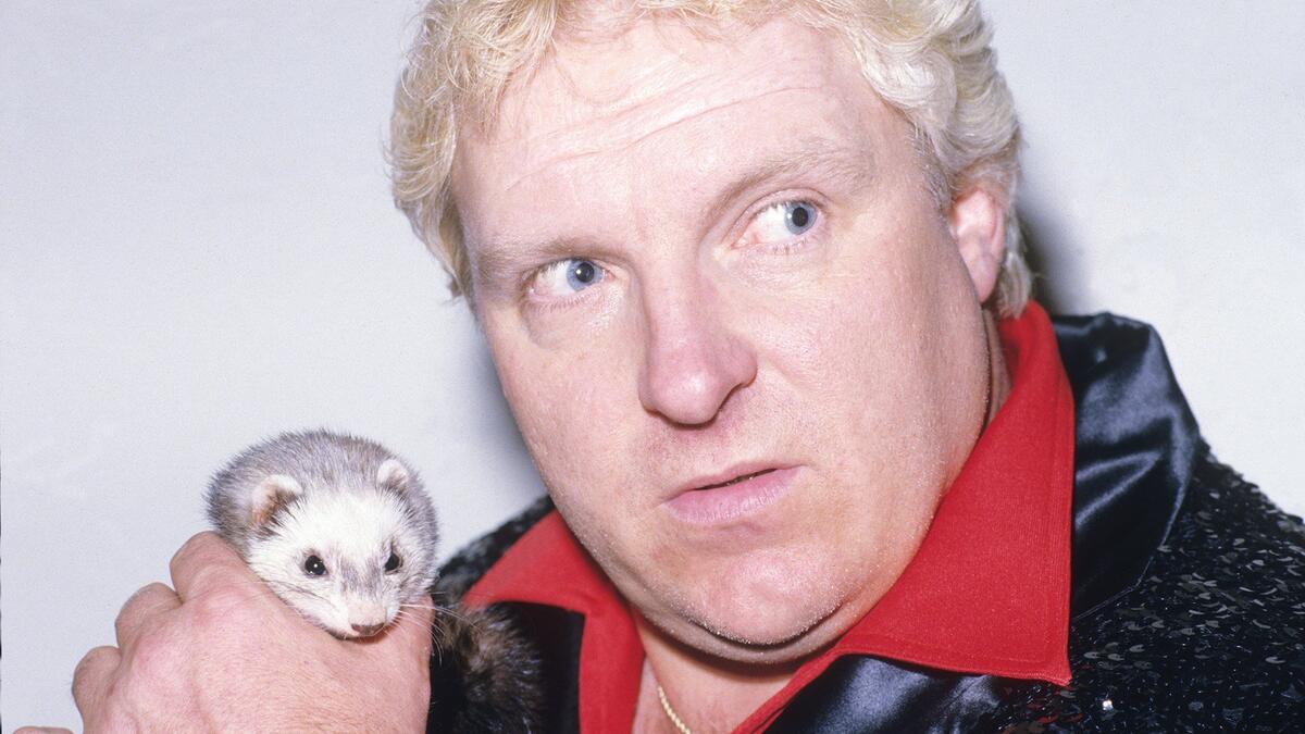 Bobby Heenan with a weasel 