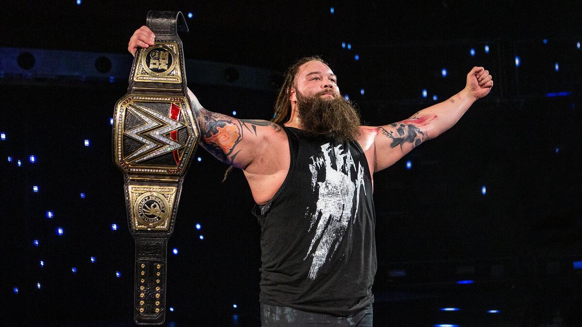 Bray Wyatt celebrating with the WWE Title at Elimination Chamber 2017