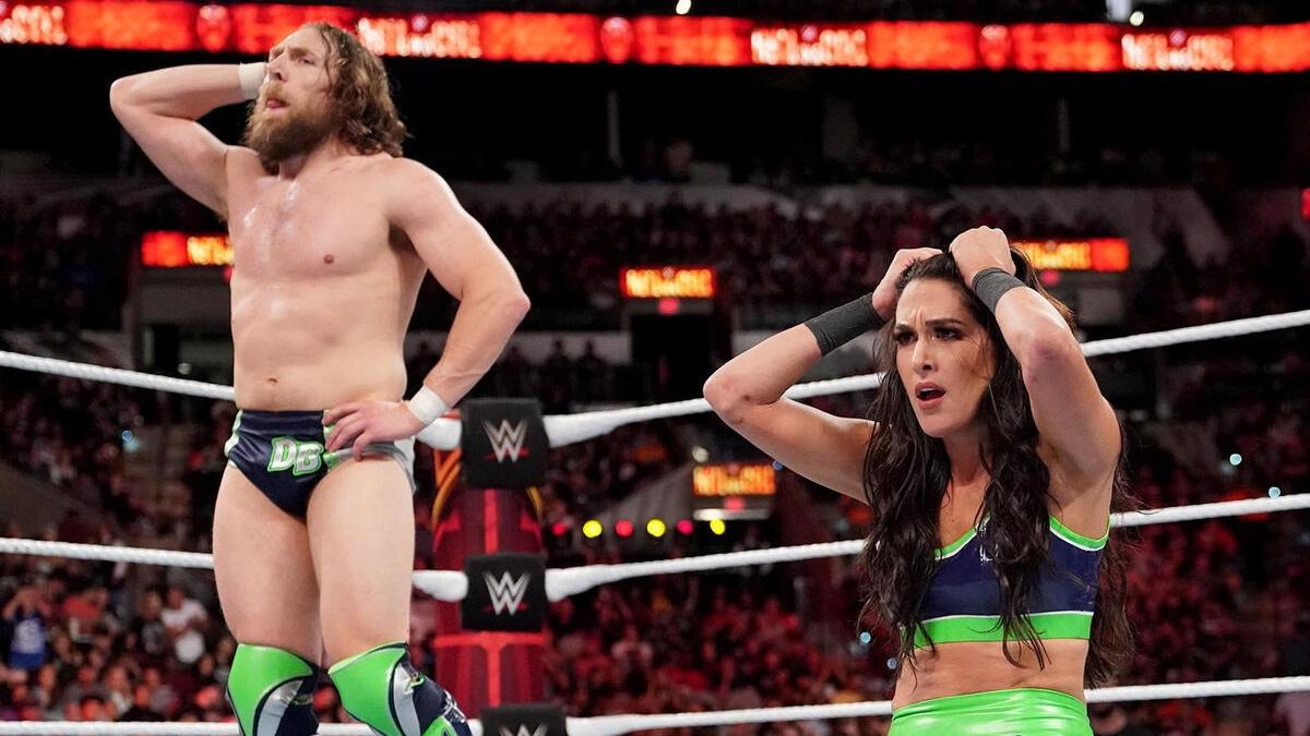 Brie Bella and Daniel Bryan looking sad at WWE Hell in a Cell 2018