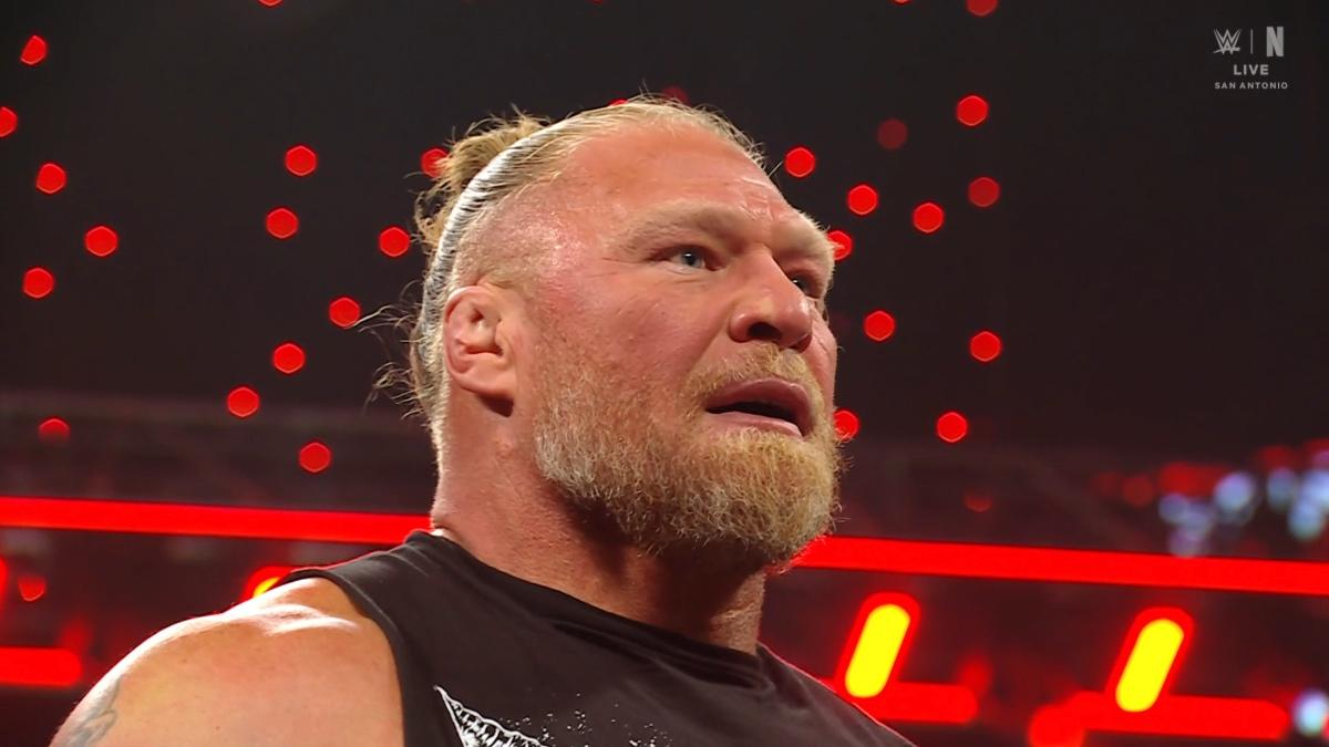 Brock Lesnar sweating in a black vest