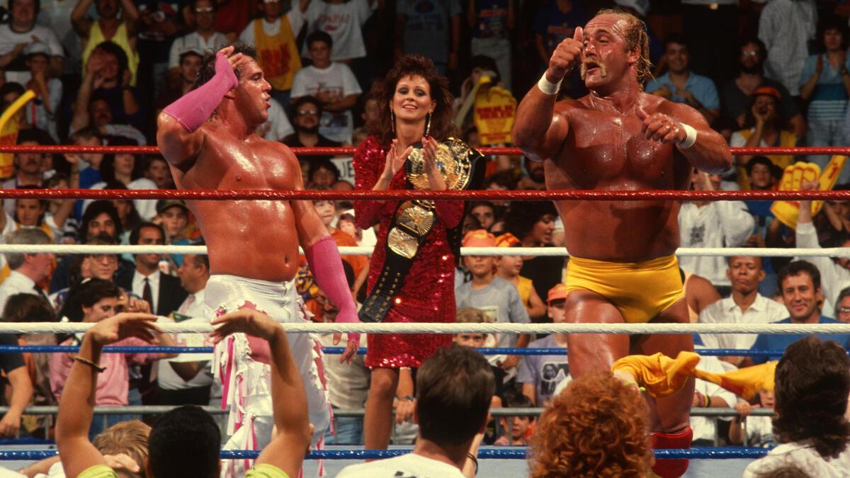 Brutus Beefcake and Hulk Hogan cupping their ears 