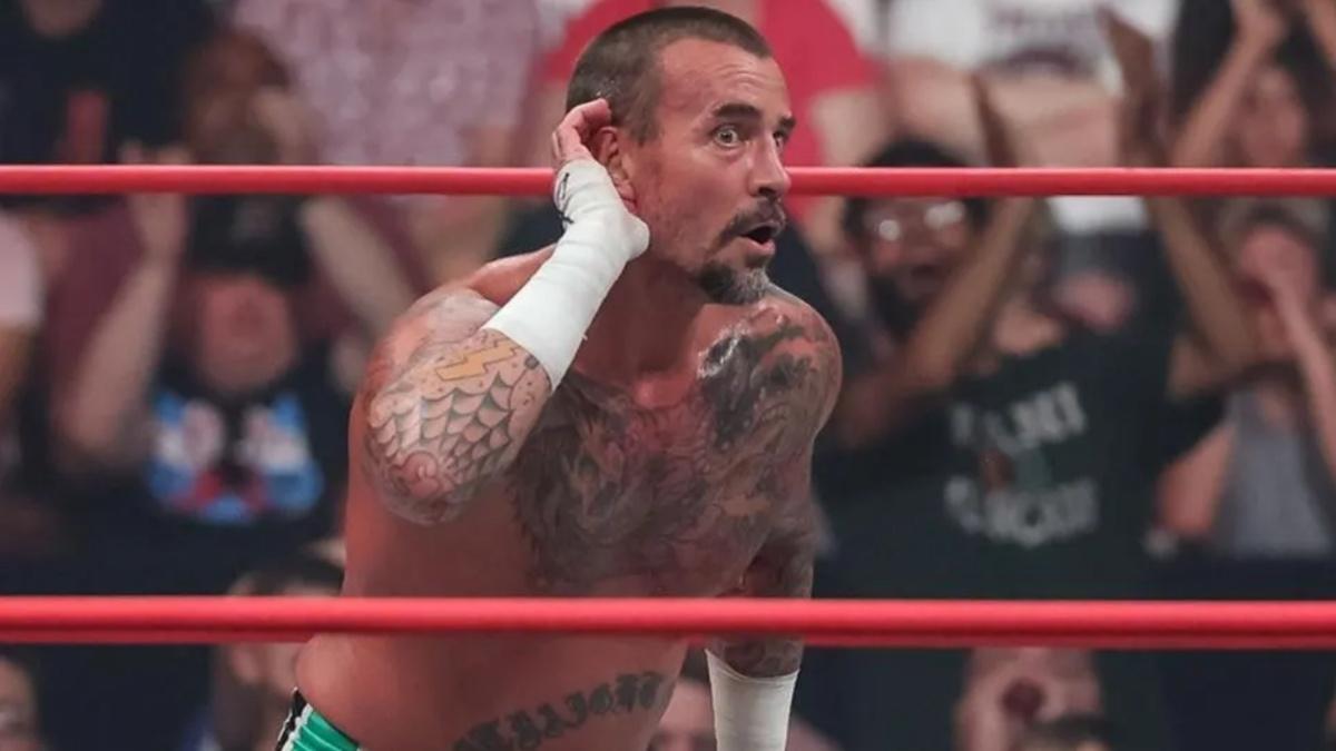 CM Punk holding his hand to his ear on AEW Collision