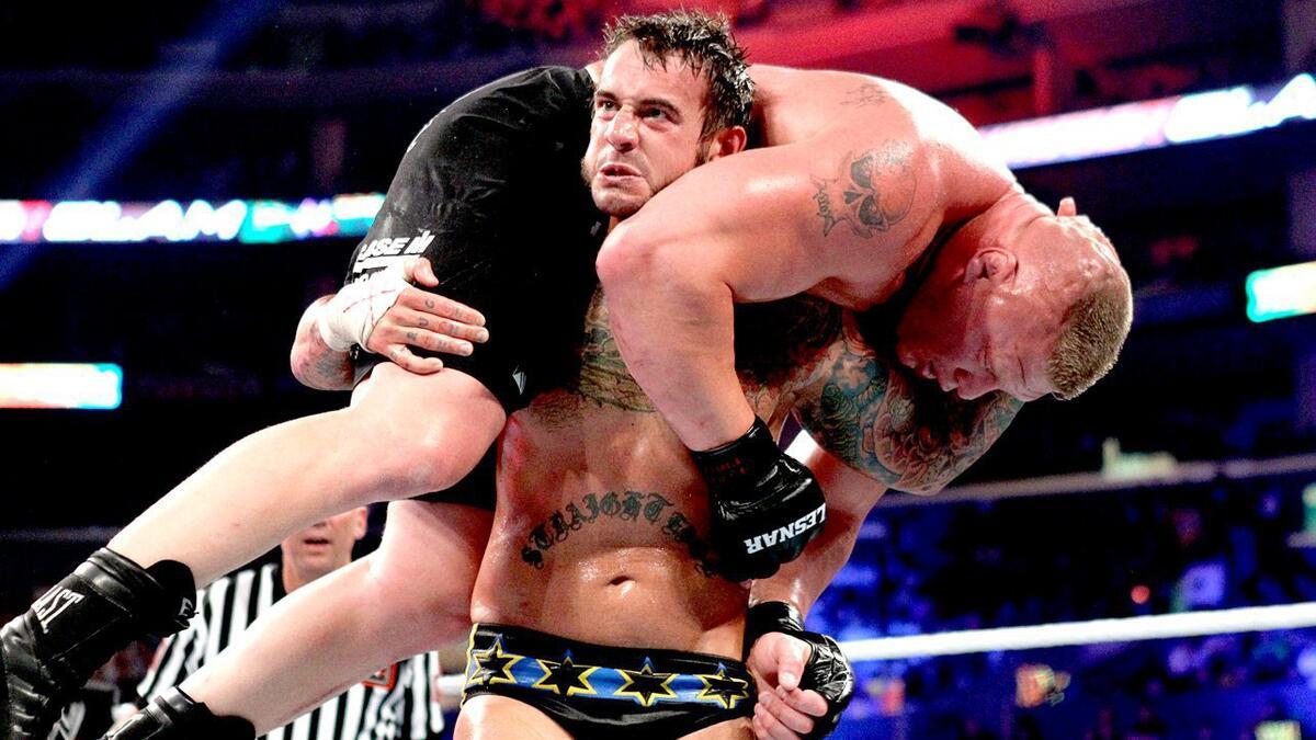 CM Punk with Brock Lesnar on his shoulders at WWE SummerSlam 2013