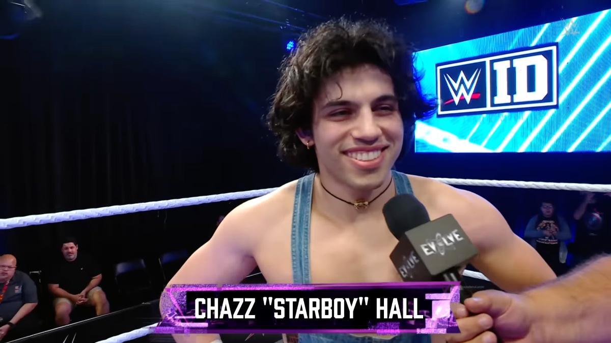 Chazz 'Starboy' Hall smiling in denim dungarees on WWE EVOLVE