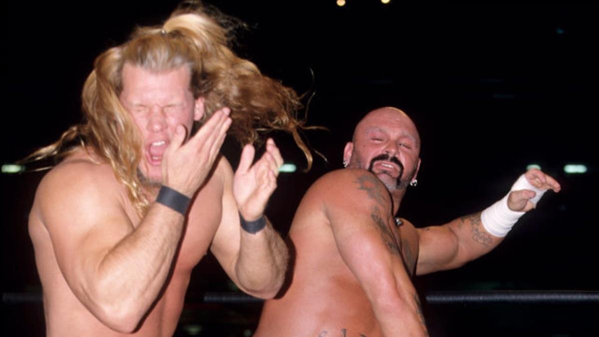 Chris Jericho holding his face after being struck by Perry Saturn on WCW TV