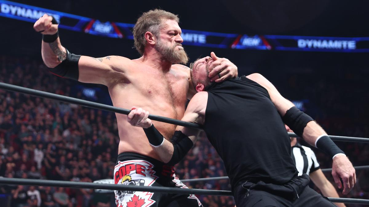 Cope hitting clubbing blows to Christian Cage while he's trapped in the rope on December 6, 2023 episode of AEW Dynamite