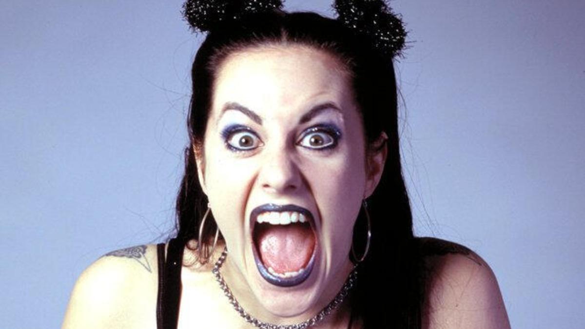 WCW star Daffney pulls a wild facial expression for a backstage photo