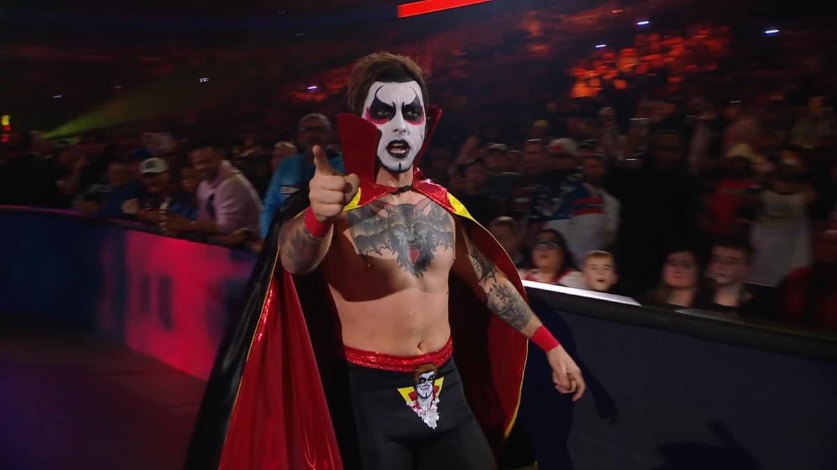 Danhausen walking around the ring and pointing at WWE Elimination Chamber 2026