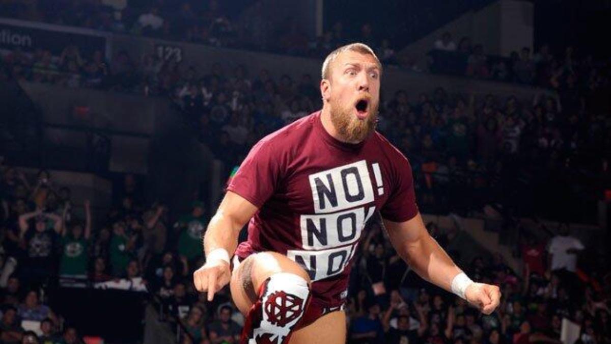 Daniel Bryan standing on the top turnbuckle wearing a No! No! No! t-shirt