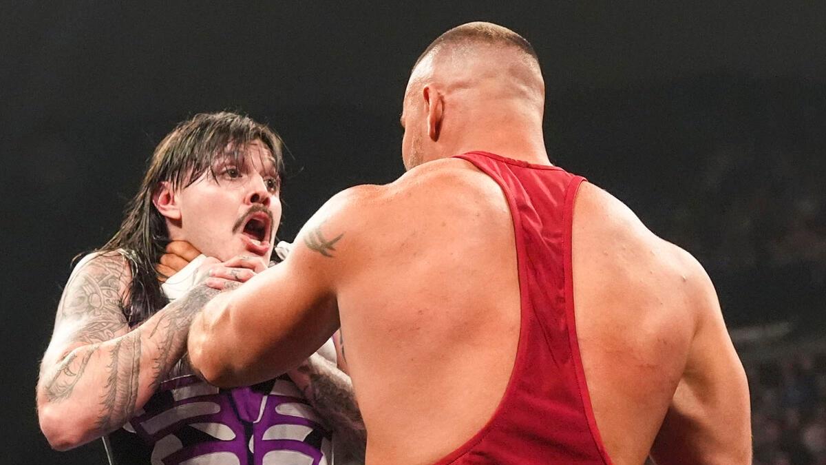 Bron Breakker grabbing Dominik Mysterio by the throat