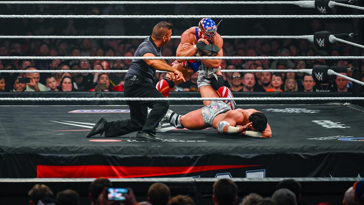 El Grande Americano with an ankle lock on Dragon Lee on WWE Raw