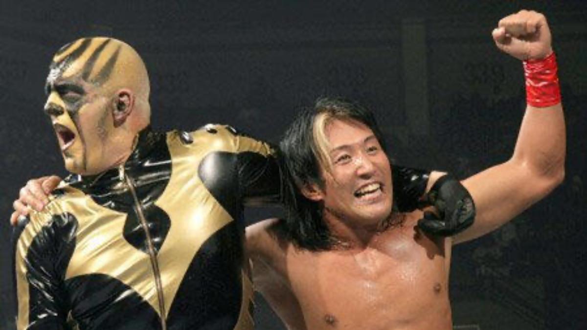 Goldust and Yoshi Tatsu embracing