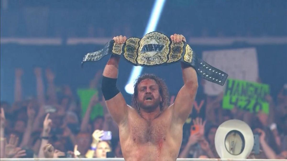 Hangman Adam Page lifts the AEW World Championship