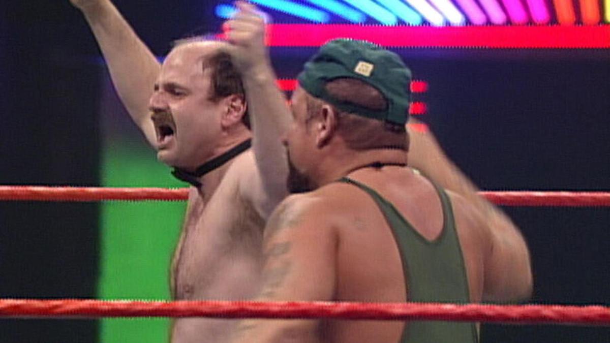 Howard Finkel topless celebrating his Tuxedo Match win