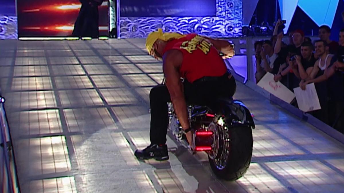 Hulk Hogan touching the side of a motorbike