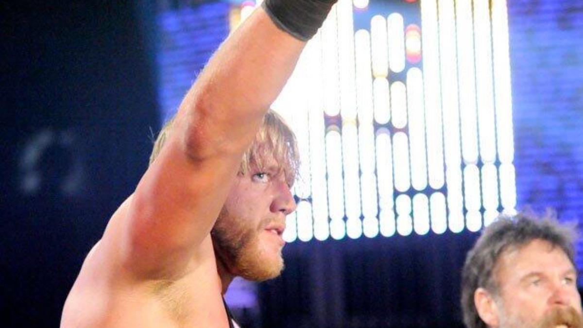 Jack Wagger pointing at the WrestleMania sign