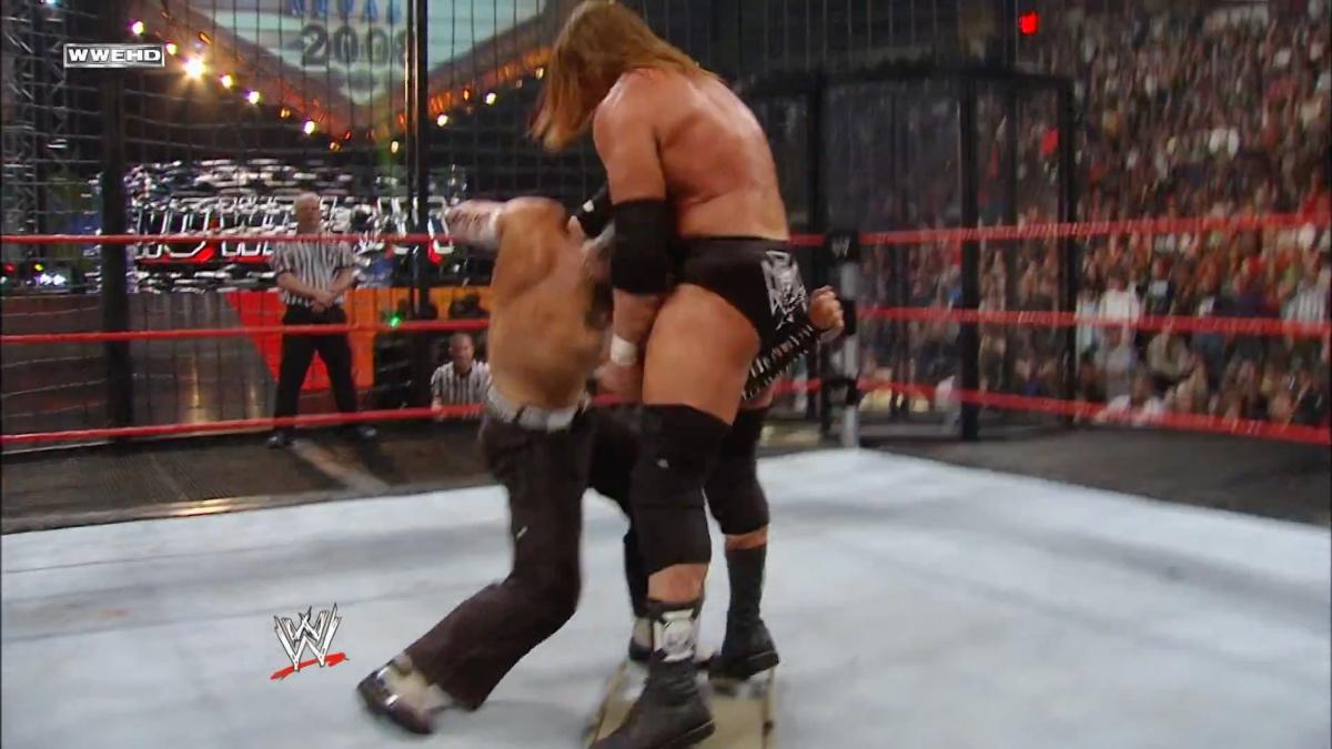 Jeff Hardy hitting Triple H with a low blow at No Way Out 2008