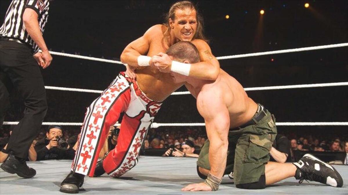 Shawn Michaels with John Cena in a headlock at WrestleMania 23