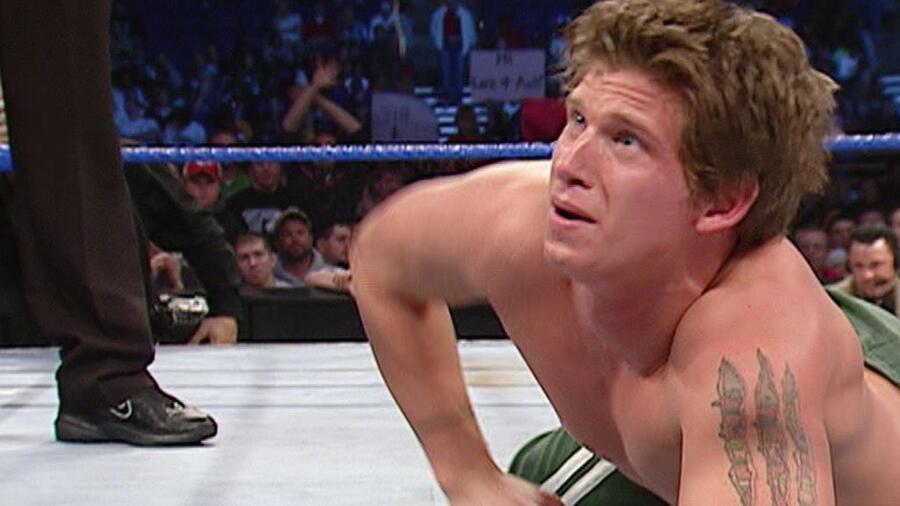 Josh Mathews in green pants on November 4, 2004 episode of SmackDown