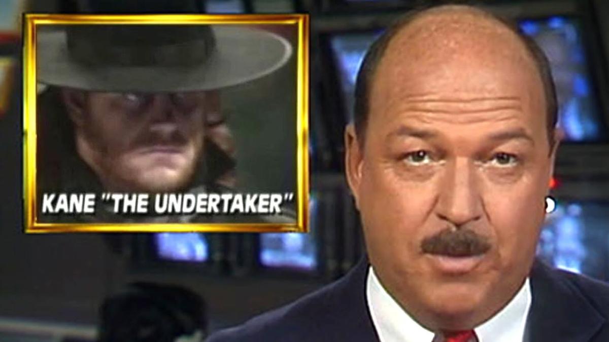 Gene Okerlunk with "Kane" The Undertaker next to him