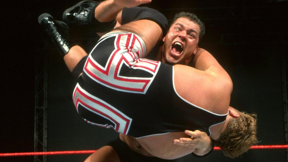 Kurt Angle powerlsams Owen Hart during an untelevised WWE match in 1999