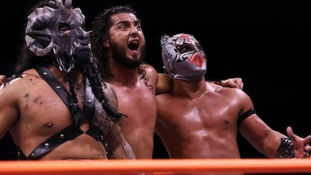La Faccion Ingobernable standing arm in arm in AEW