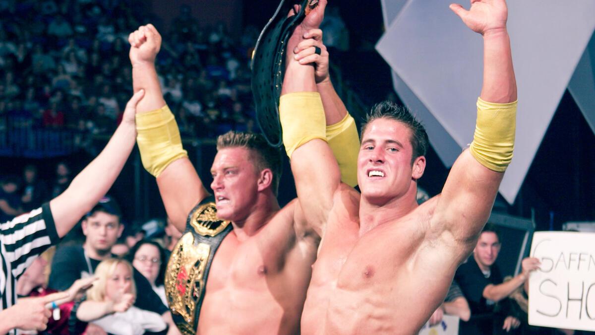 La Resistance - Rene Dupree and Sylvain Grenier - celebrate after winning the WWE World Tag Team Titles in 2003