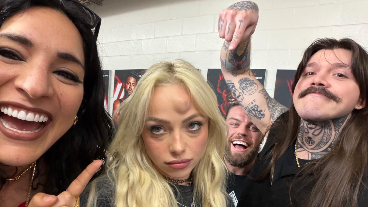 Judgment Day laughing at Liv Morgan, who has a hematoma on her head