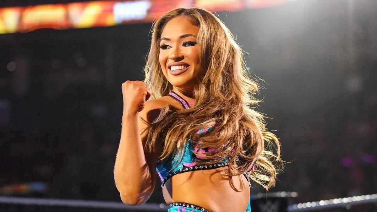 Lola Vice smiles and raises a fist prior to a match on WWE NXT in July of 2024