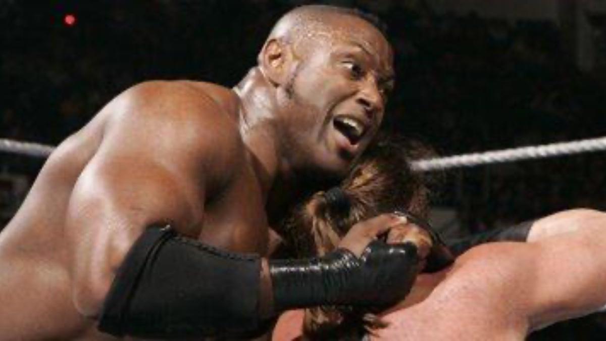 Marcus Cor Von with a wrestler in a sleeper on WWE ECW