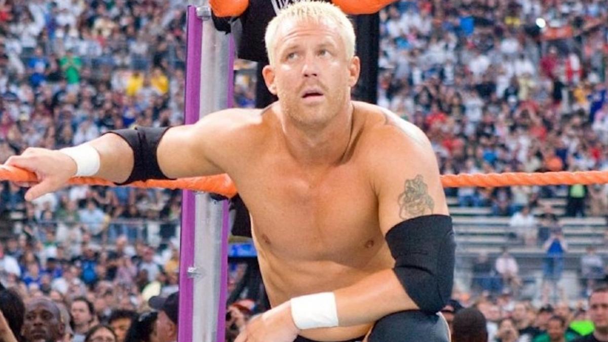 Mr. Kennedy crouching in the corner of a WWE ring