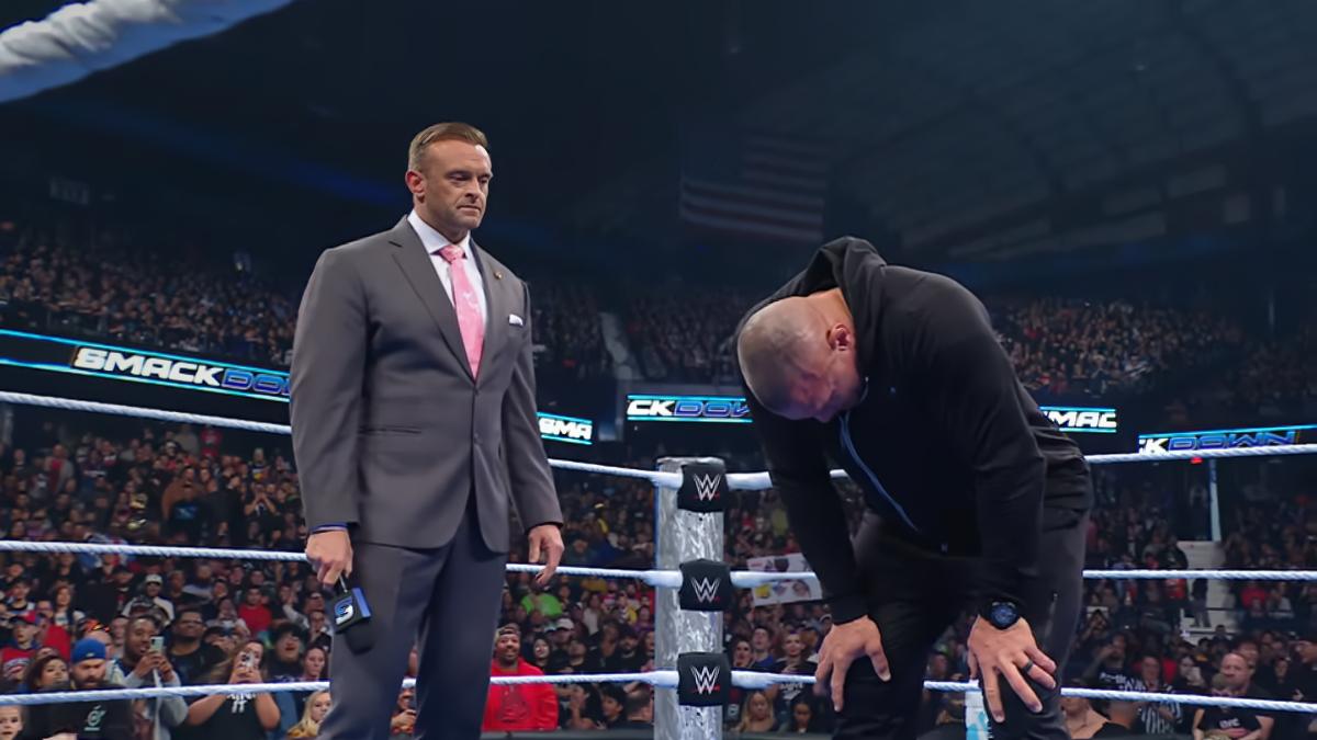 Randy Orton doubled over with Nick Aldis standing next to him on WWE SmackDown in April 2025