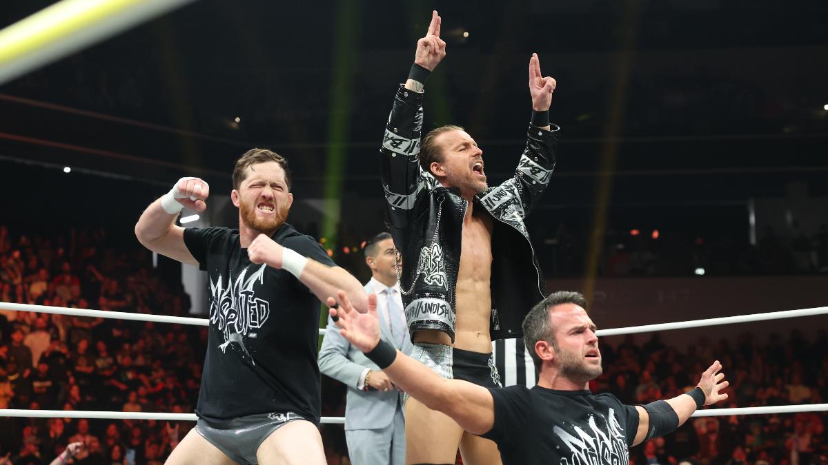 Kyle O'Reilly, Adam Cole and Roderick Strong posing on AEW Dynamite