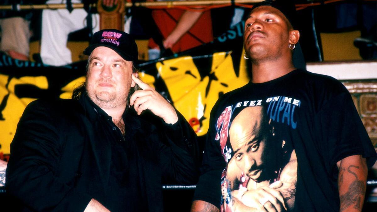 Paul Heyman standing with New Jack in ECW