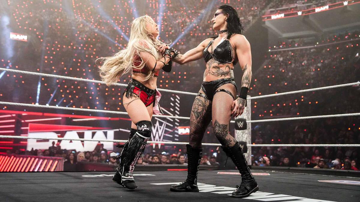 Rhea Ripley grabbing Liv Morgan on WWE Raw Netflix premiere