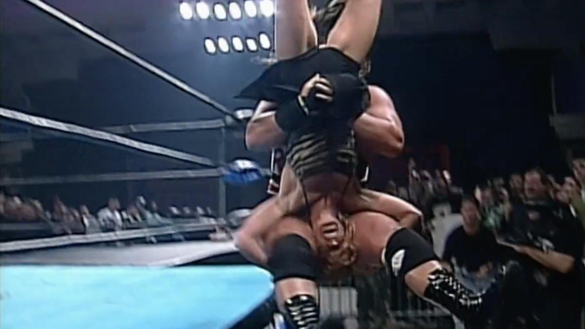 Rhino hitting a piledriver to Lori Fullington at ECW Hardcore Heaven 2000