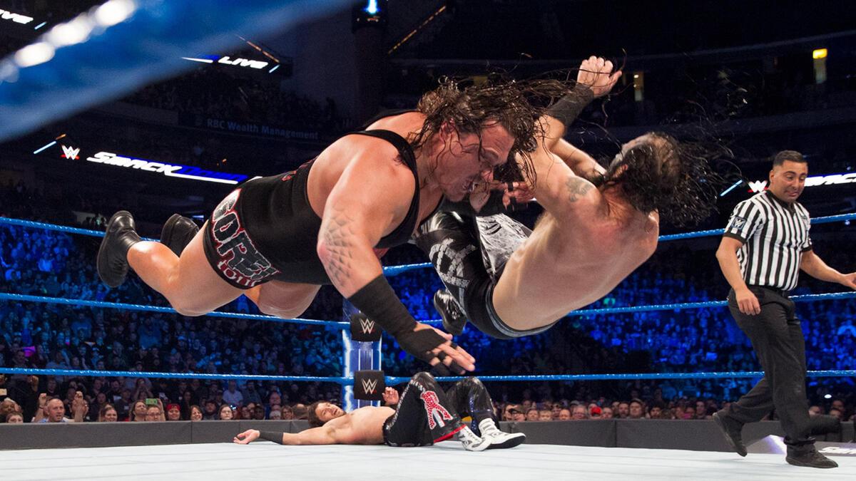 Rhyno hits a Gore on Ascension member Viktor during a match in 2017